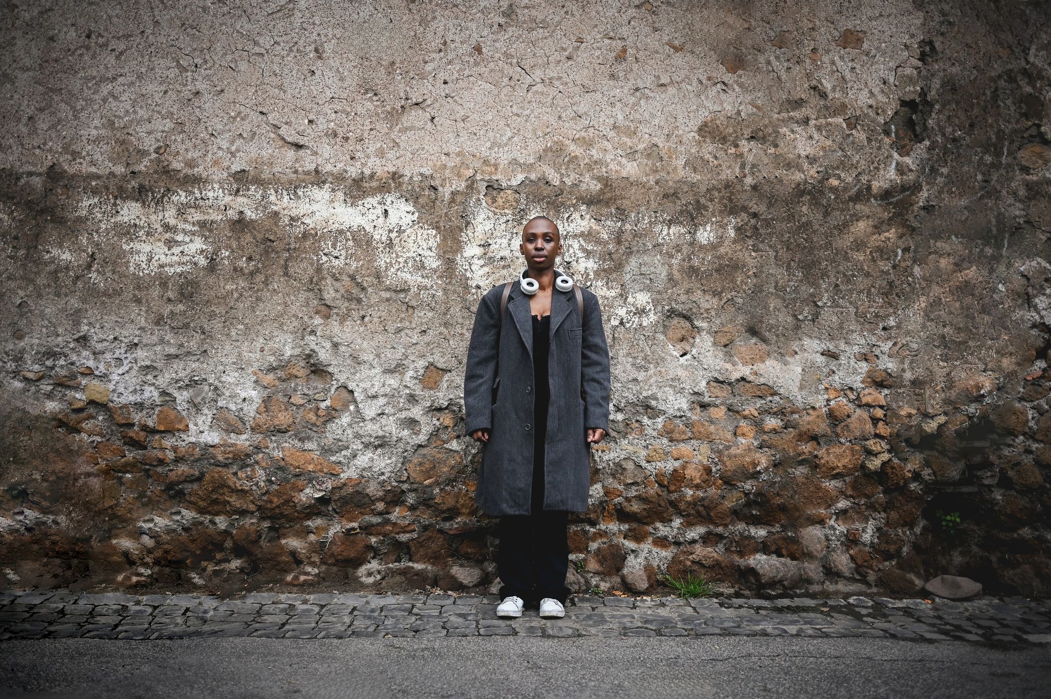 Street-style fashion portrait in an urban setting